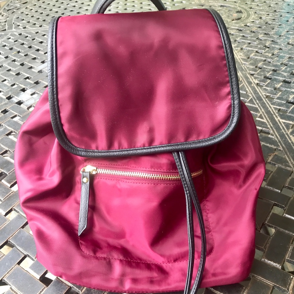 Cranberry colored mini backpack